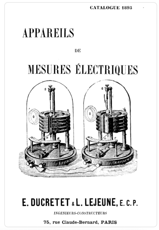 A black and white picture of two machines
Description automatically generated