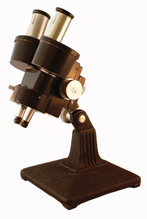 A close-up of a microscope
Description automatically generated