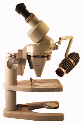 A close-up of a microscope
Description automatically generated