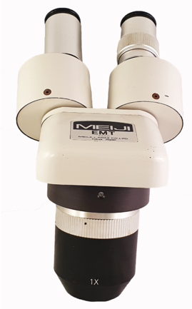 A close-up of a microscope
Description automatically generated