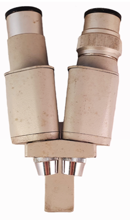 A close-up of a microscope
Description automatically generated