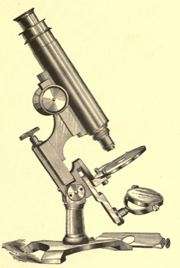 A close-up of a microscope
Description automatically generated with low confidence