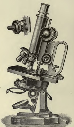 A picture containing microscope
Description automatically generated