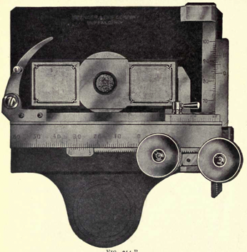A black and white photo of a camera
Description automatically generated with low confidence