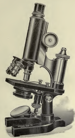 A black and white photo of a microscope
Description automatically generated with low confidence