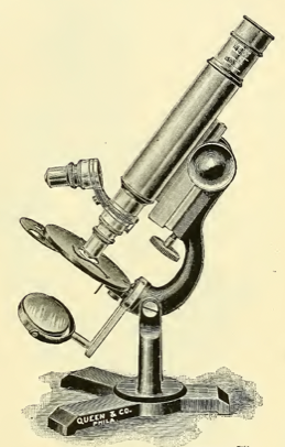 A close-up of a microscope
Description automatically generated with low confidence