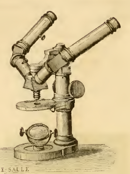 A picture containing old, telescope
Description automatically generated