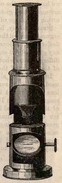 A picture containing text, old, gear
Description automatically generated