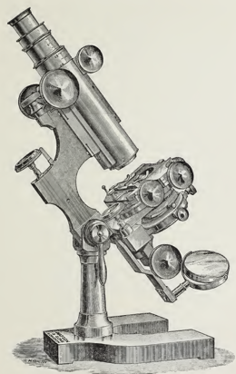A picture containing old, gear
Description automatically generated
