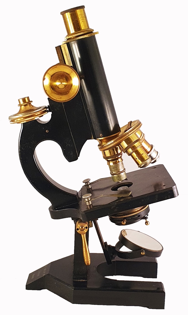 A close-up of a microscopeDescription automatically generated