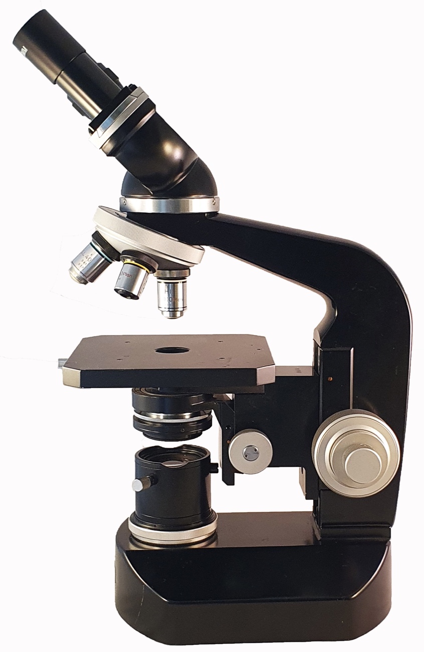 A close-up of a microscopeDescription automatically generated