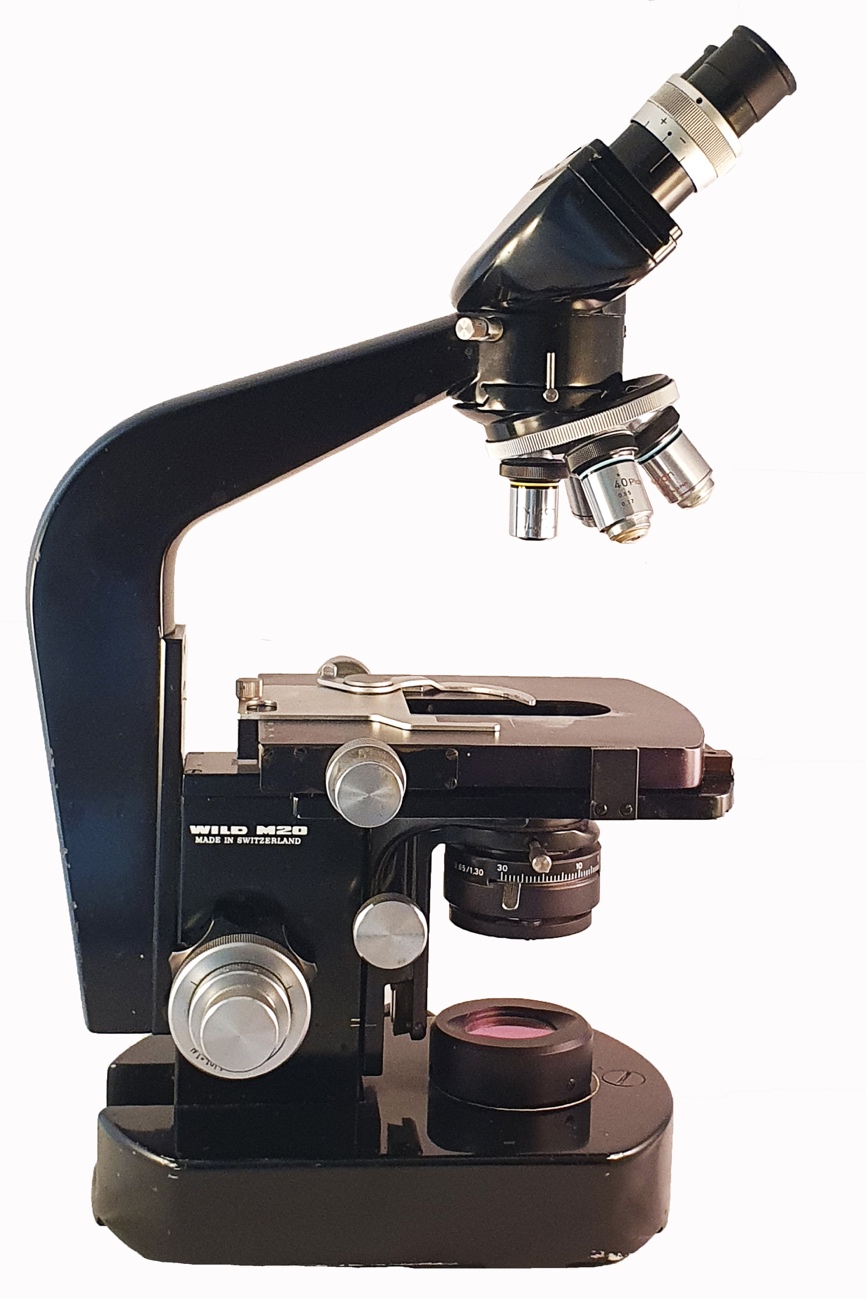A close-up of a microscopeDescription automatically generated
