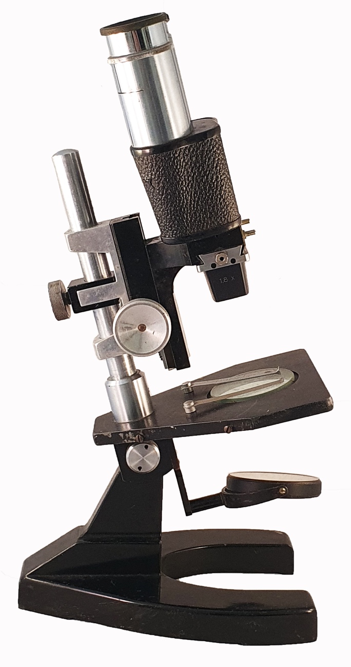 A close-up of a microscopeDescription automatically generated