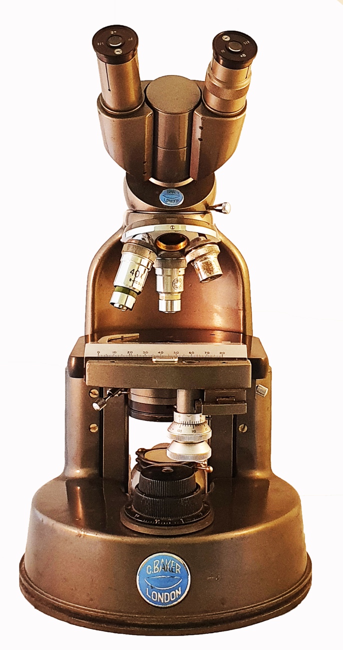 A close-up of a microscopeDescription automatically generated