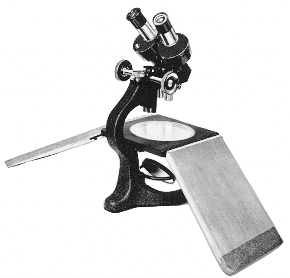 Beck Star Microscope A microscope with a magnifying glassDescription automatically generated ...