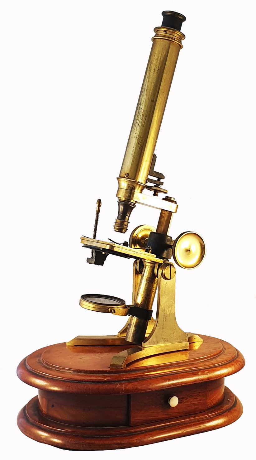 A close-up of a microscopeDescription automatically generated
