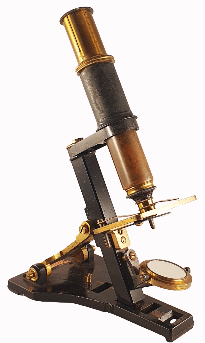 A close-up of a microscopeDescription automatically generated