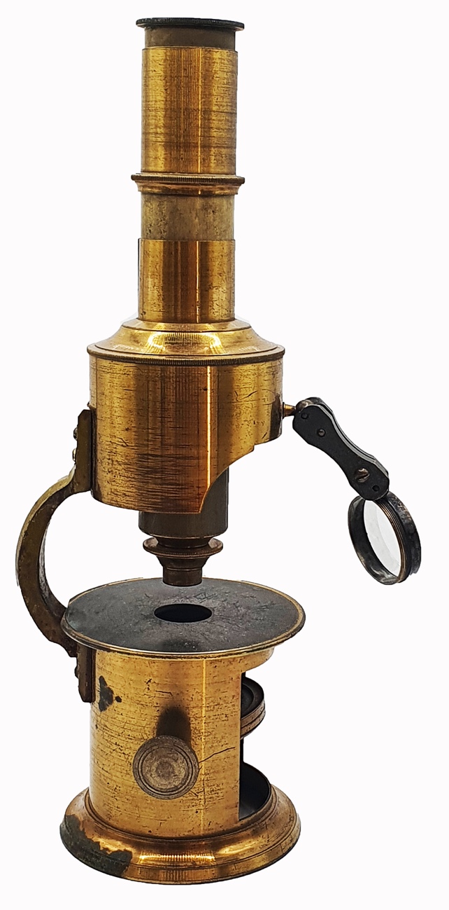 A close-up of a magnifying glassDescription automatically generated