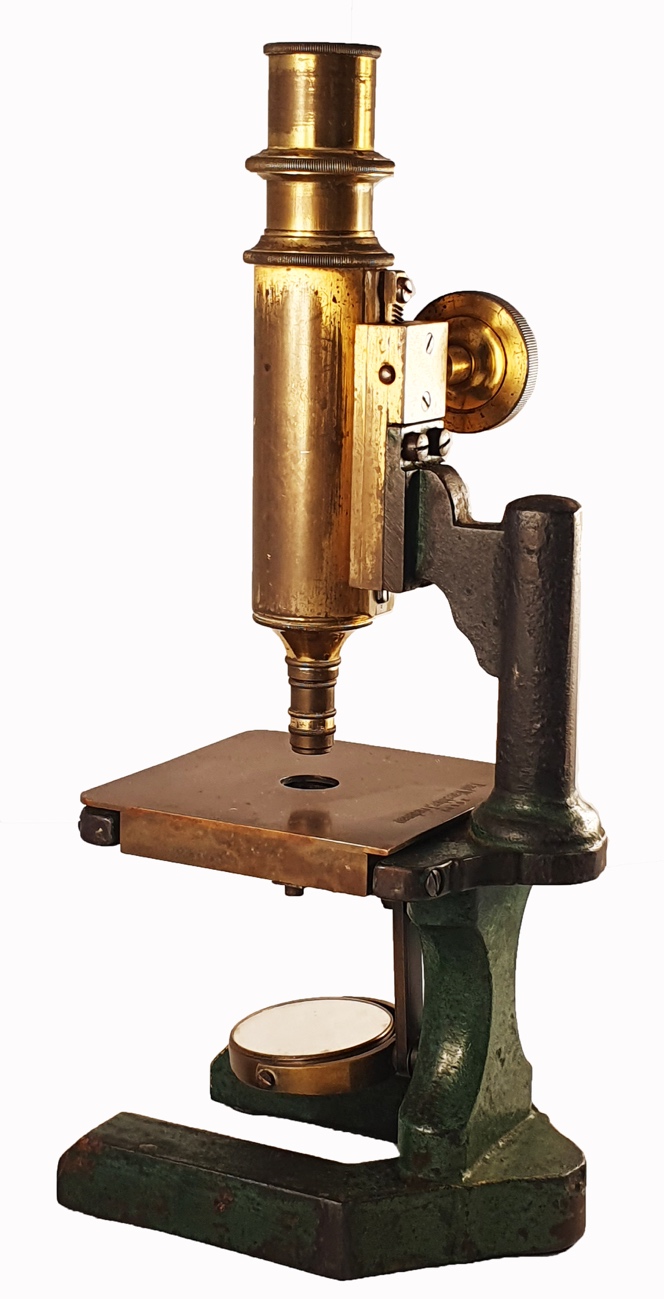 A close-up of a microscopeDescription automatically generated