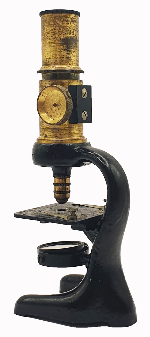 A close-up of a microscopeDescription automatically generated