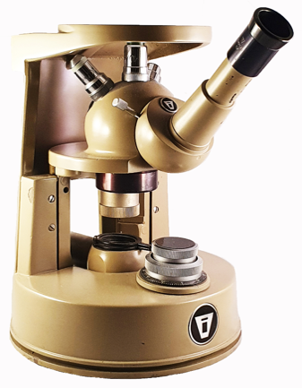 A close-up of a microscope
Description automatically generated