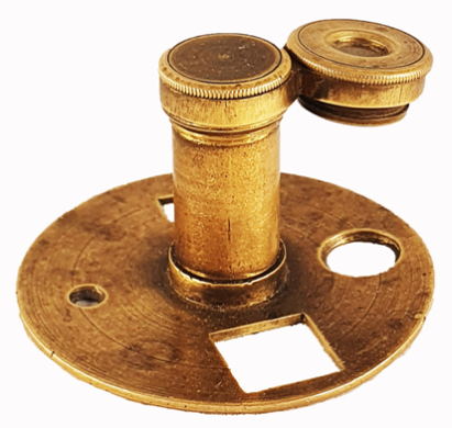 A gold object with holes
Description automatically generated