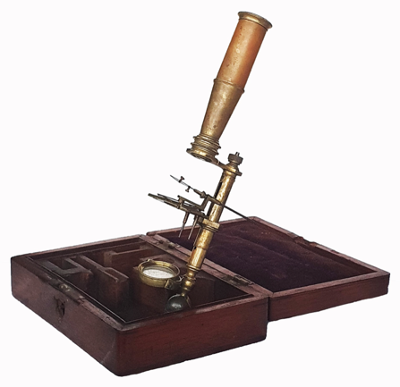 A metal object in a wooden box
Description automatically generated