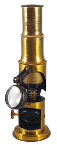 A picture containing object, yellow, sitting, black
Description automatically generated