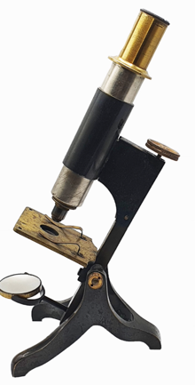 A close-up of a microscope
Description automatically generated