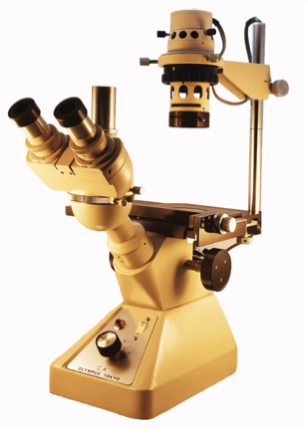 A close-up of a microscope
Description automatically generated