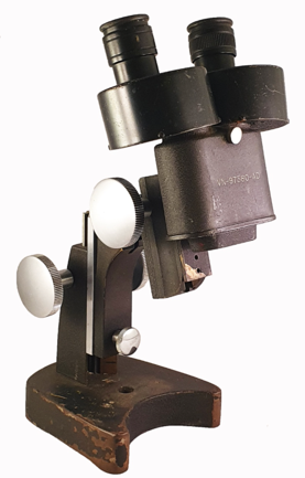 A close-up of a microscope
Description automatically generated