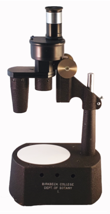 A close-up of a microscope
Description automatically generated