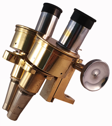 A close up of a microscope
Description automatically generated